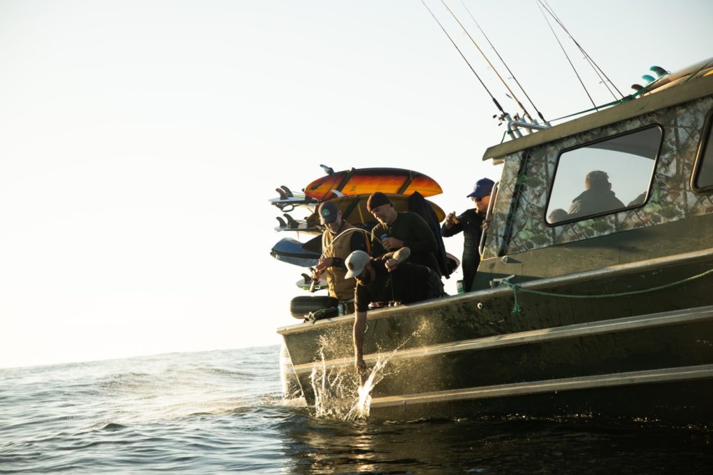 A beautiful fishing boat pulling in the catch of the day